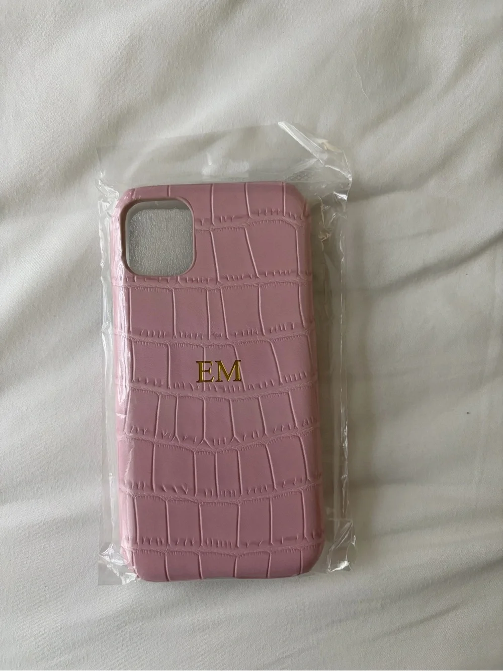 Pink iphone case with gold monogram